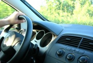 Driver and steering wheel